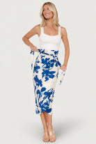 Back view showing the skirt’s partially lined back panel and how the fabric falls into a soft A-line silhouette from the high waist.