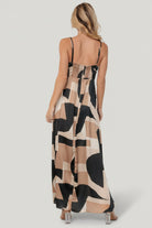Detail shot of tank straps and fabric trim on the Xanthe slip dress, highlighting strap finish and subtle print.