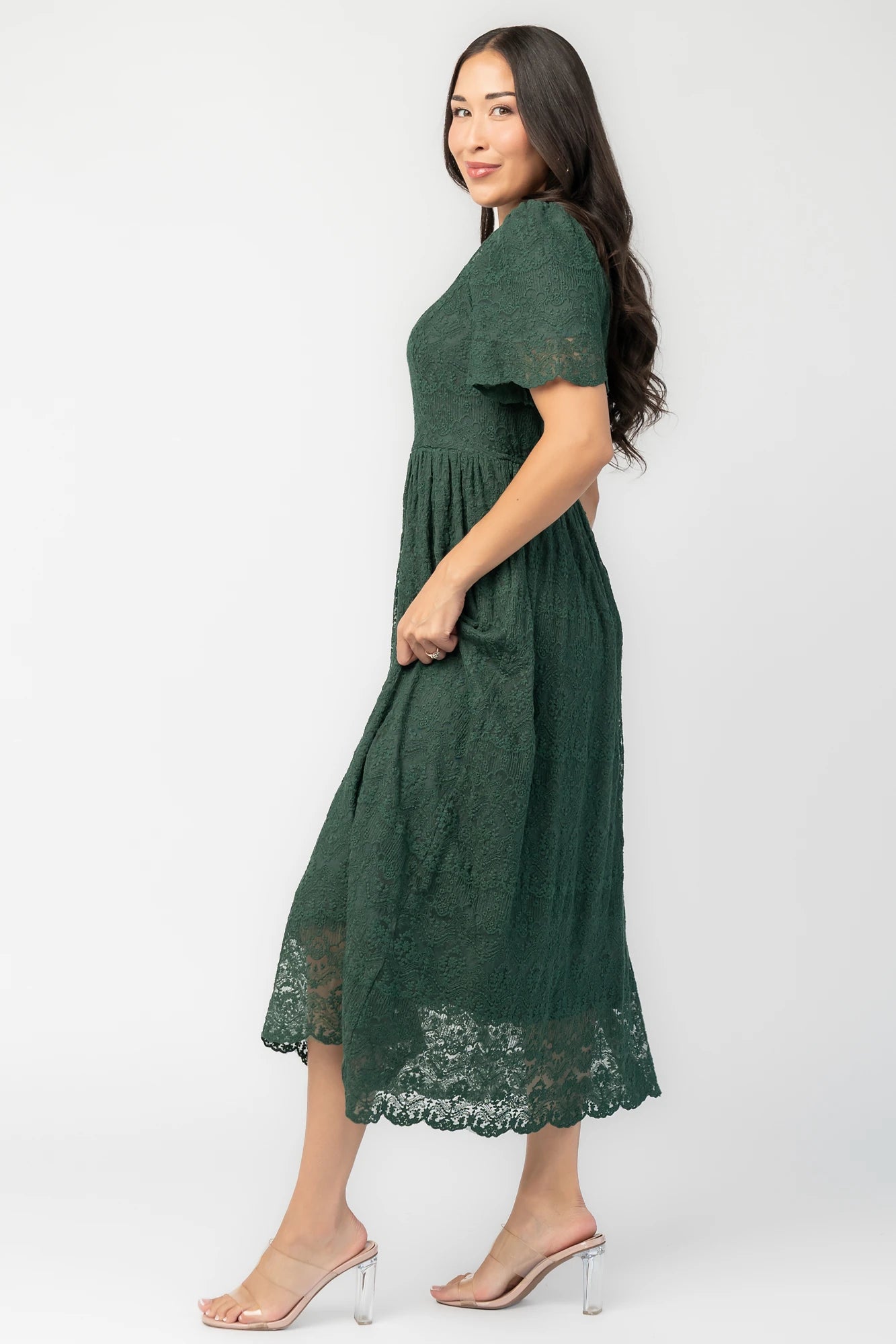 Yvaine Lace Midi Dress in Emerald with embroidered lace, scalloped neckline, short sleeves, and scalloped hem.