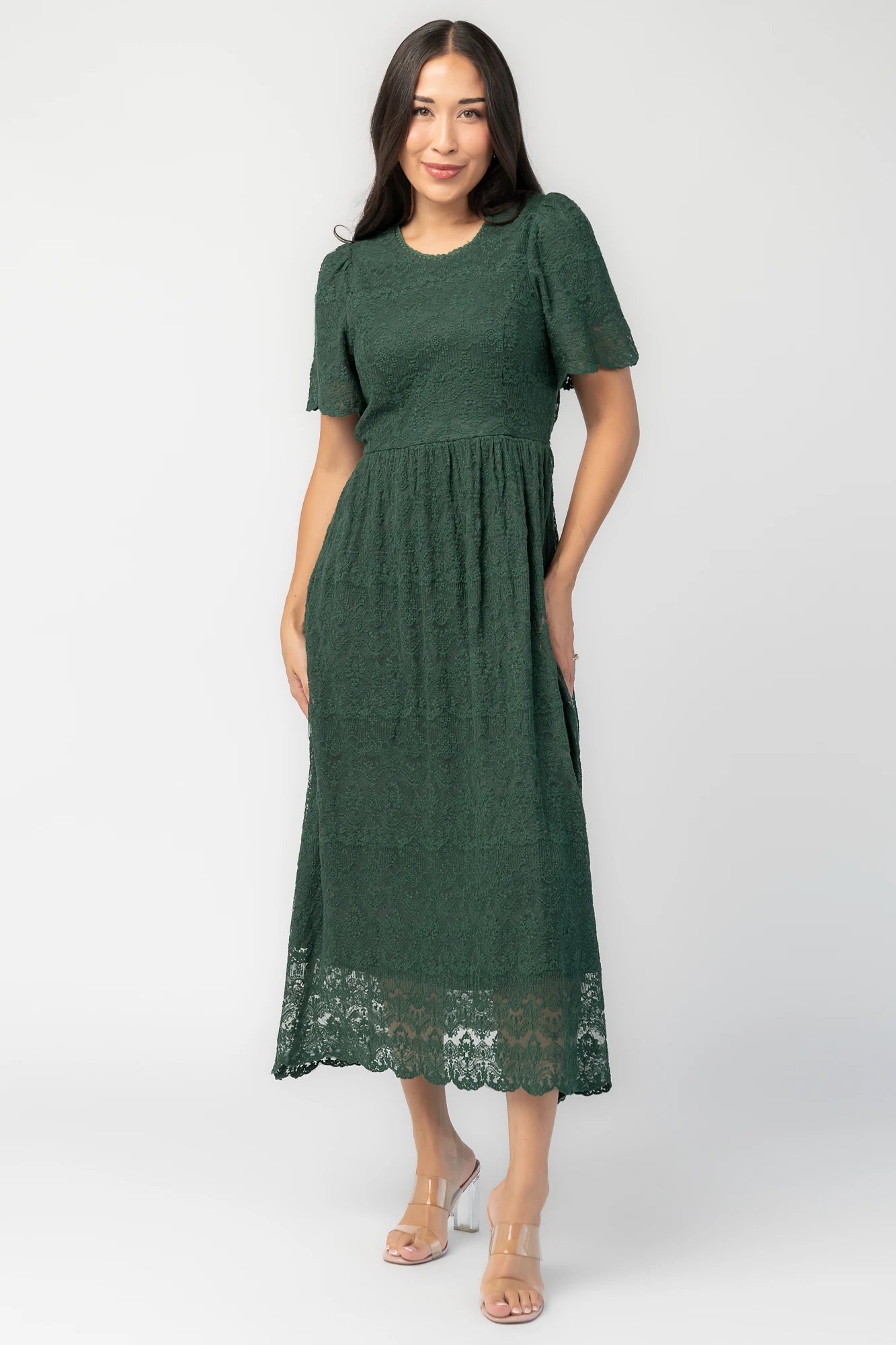Yvaine Lace Midi Dress in Emerald with embroidered lace, scalloped neckline, short sleeves, and scalloped hem.