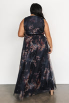 Styled detail shot of the dress paired with delicate accessories, focusing on neckline, sleeves and upper bodice fit.
