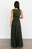 Close-up of the Kamila Tulle Maxi Dress Juniper Green showing smocked waist detail, delicate tulle overlay, and smooth lining underneath.