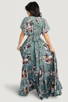 Fabric and pattern close-up of the Katherine Maxi Dress in dusty green floral showing print scale, muted color palette, and chiffon texture.