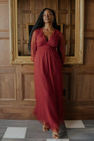 Styled full-length image of Layla Tulle Maxi Dress in terracotta on a model standing; shows silhouette, sleeve length, and floor-skimming hem.