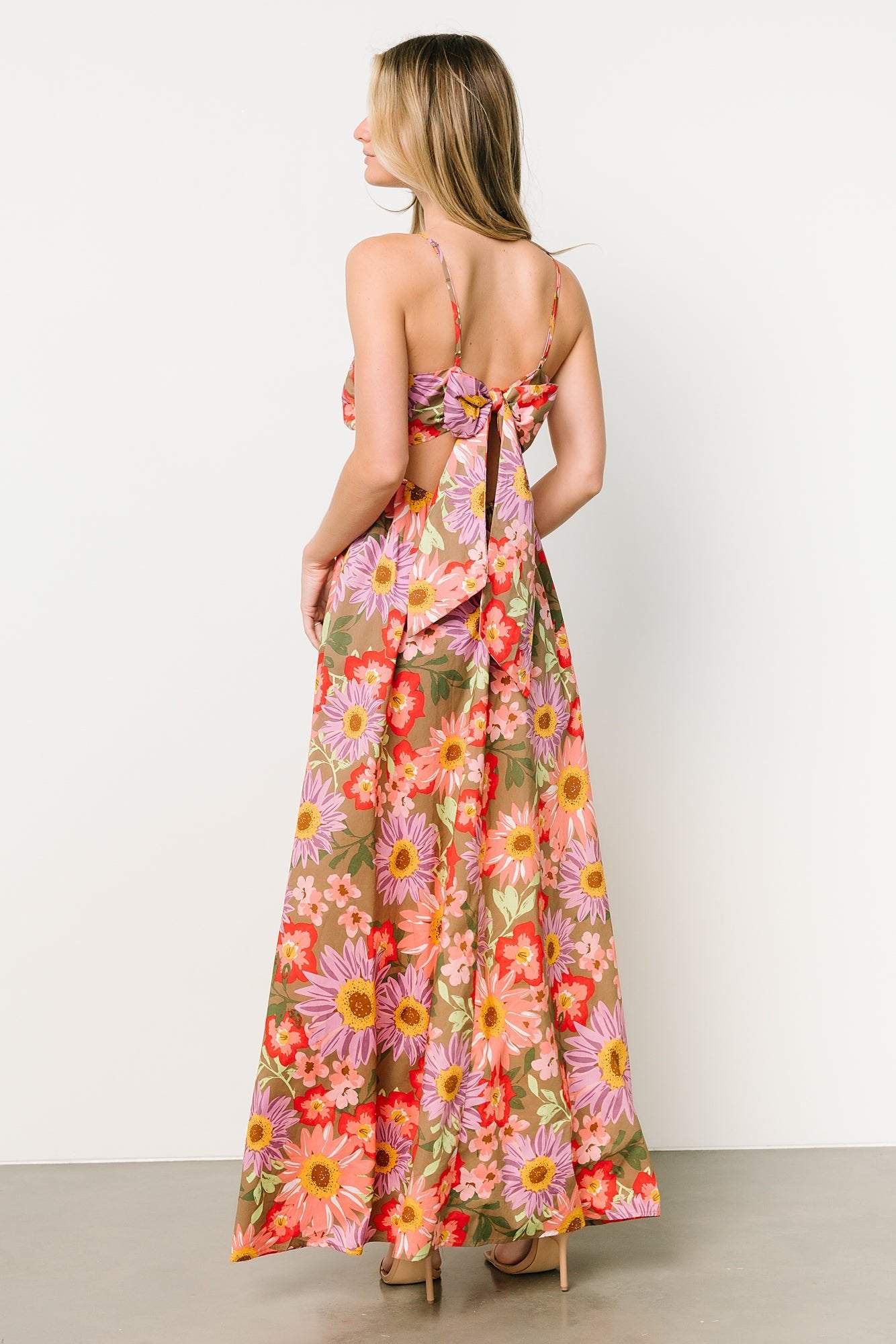 Back view of Rosalee maxi dress showing open tie-back, adjustable straps and elastic back waist for a customizable fit.