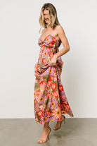 Detail of Rosalee dress fabric showing cotton texture and multicolor floral print, ideal for breathable warm-weather wear.